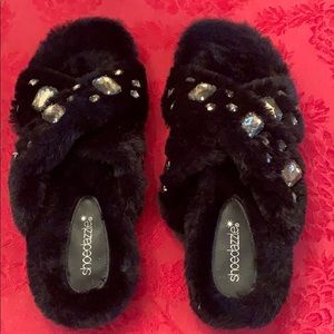 Fuzzy, sparkly flip flops. Never worn.